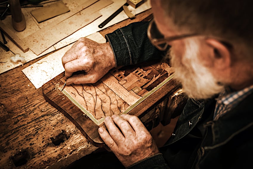 Craftsman Repairing Veneer
